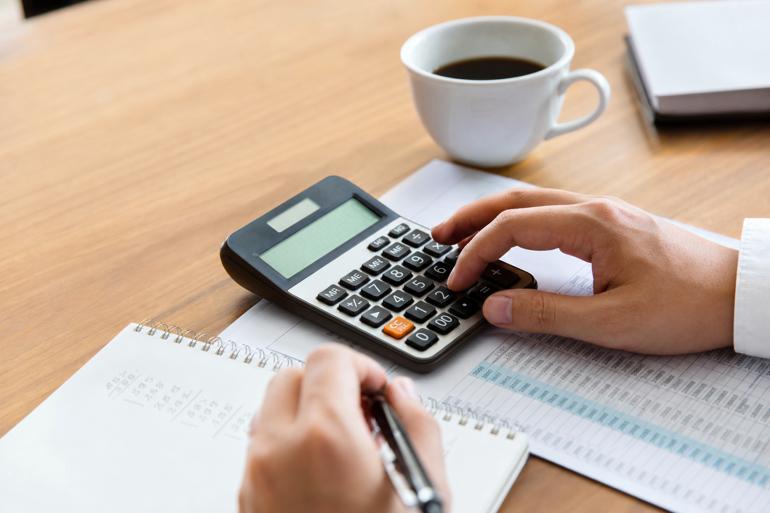 Working out the cost of a merchant cash advance with a calculator and spreadsheet